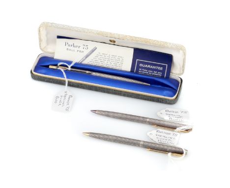 a pair of pencils, loose, and a ballpoint pen, in presentation box, all three marked "Sterling Silver", all cross hatch desig