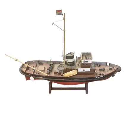 Two model boats including a tug, the largest 102cm long