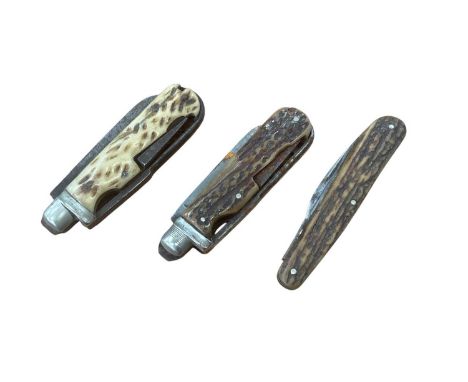 Two old multi- tool pocket knives with staghorn grips and similar pocket knife (3)