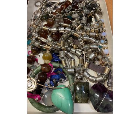 Group of silver mounted semi-precious bead necklaces, bracelets, pendants and a green hard stone bangle
