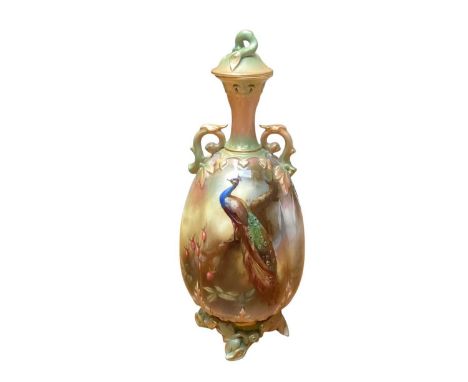 Royal Worcester porcelain vase and cover with hand painted peacock decoration, signed W. Powell, 24cm highThe cover appears t