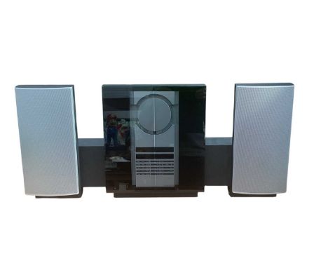 Bang &amp; Olufsen BeoSound 3000 CD player with remote control and manualTurns on and looks in good condition