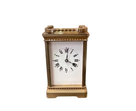 Brass cased striking carriage clock, in original leather case with glass, key present, 12.75cm high