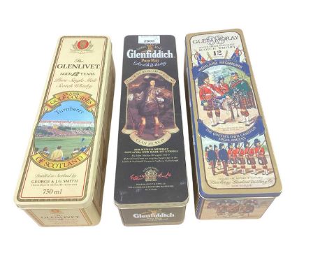 Three single malt scotch whiskies in presentation tins: Glen Moray 12 years Queen's Own Cameron Highlanders, Glenlivet 12 yea