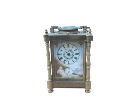 20th century brass carriage clock, with three hand painted porcelain panels depicting nude women. 17cm in overall height.
