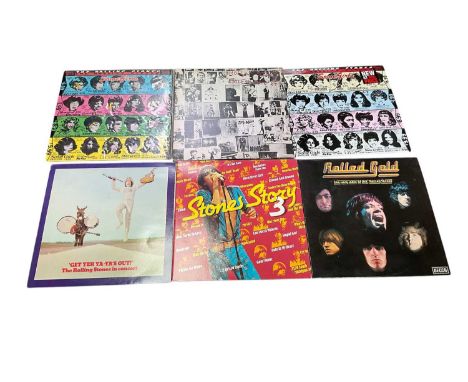 Collection of Rolling Stones items, including LPs (Some Girls, Tattoo You, Exile On Main St, etc), and a group of band tour t