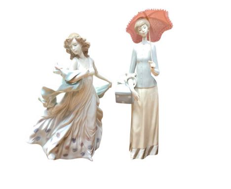 Group of twelve Lladro, NAO and Royal Doulton figures.