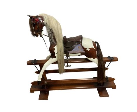 Fine Stevenson Brothers limited edition 'Tinkerbell' rocking horse, the oak 'pinto' body painted to match the Queen's favouri