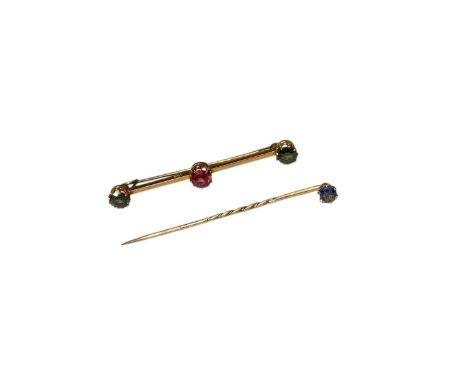 9ct gold multi-gem three stone bar brooch, 58mm, together with a sapphire stick pin, 60mm (2)Three stone bar brooch is marked