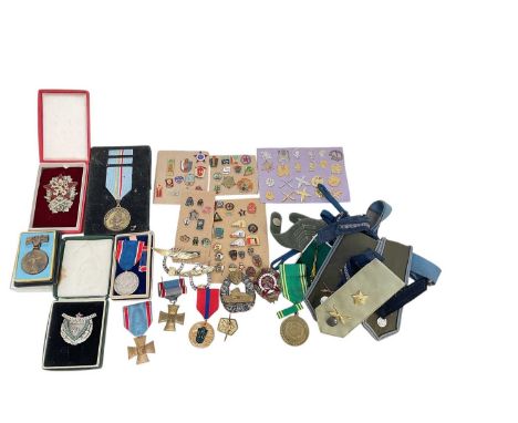 Group of Cold War era Militaria to include Czechoslovakian army badges and decorations (1 box).