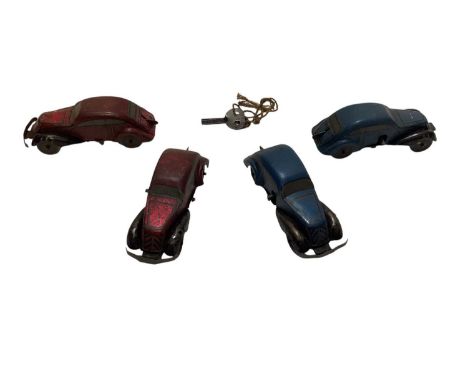 Tinplate racing track with four clockwork cars and tinplate clockwork roller (1 box)
