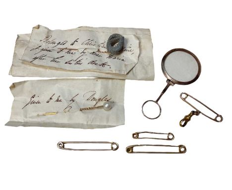 Two 18ct gold and two yellow metal tie pins, yellow metal mounted magnifying glass, cultured pearl stick pin and one other su