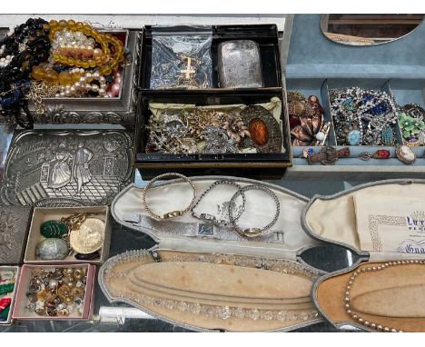 Early 20th century silver cigarette case together with costume jewellery including brooches, necklaces and faux pearl items, 