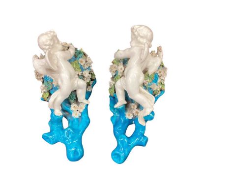 Pair of Victorian Moore Bros. majolica ceramic putti wall-pockets retailed by T. Goode &amp; Co