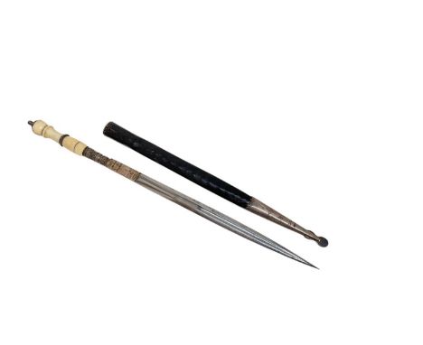 Late 19th century stiletto dagger with long tapered blade and ivory grip, in leather sheath with white metal chape, 32cm in o