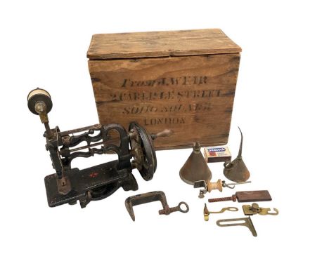 J.Weir sewing machine, circa 1870s, finished in black, the base of the sewing machine has a finely painted red and green patt