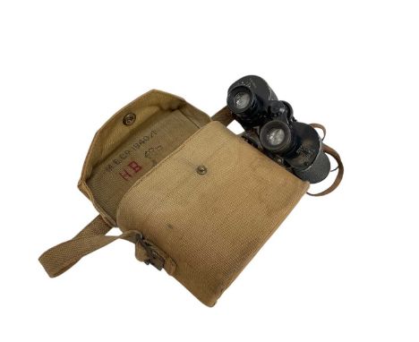 Pair of Second World War British military binoculars by Bausch &amp; Lomb in canvas case, stamped M.E.Co. 1940 and marked wit