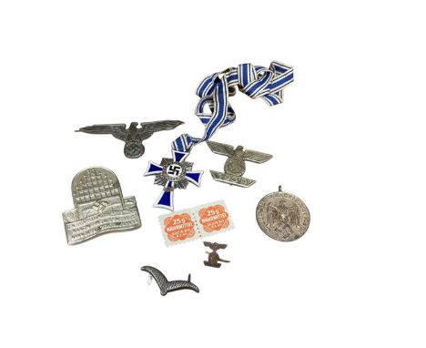 Group of seven assorted Nazi German badges and decorations to include a Mothers Cross and Second World War clasp to Iron Cros