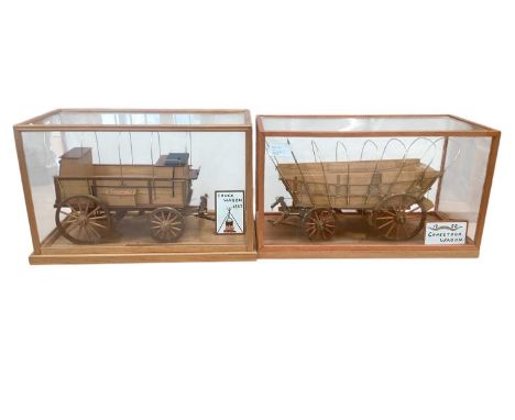 Model of a 1750 Conestoga wagon, an 1887 model of a Chuck wagon, a Franklin Mint model of a Mercedes, and five model Fords, a