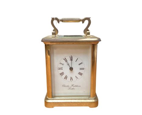 Brass chiming carriage clock, retailed by Charles Frodsham, 15cm high