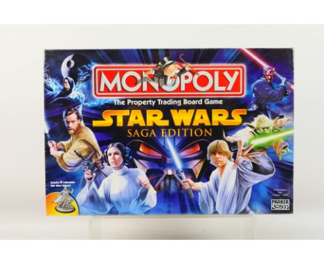 Hasbro - Monopoly - An unopened Star Wars Saga Edition Monopoly set 2005 issue. This set is still factory shrink wrapped so a