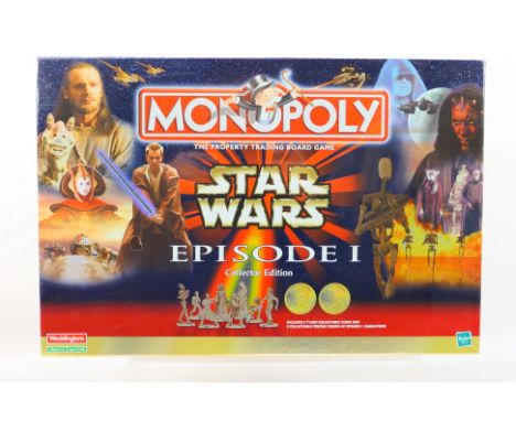 Hasbro - Monopoly - An Star Wars Episode I Collector's Edition Monopoly set 1999 issue. This set is still factory shrink wrap