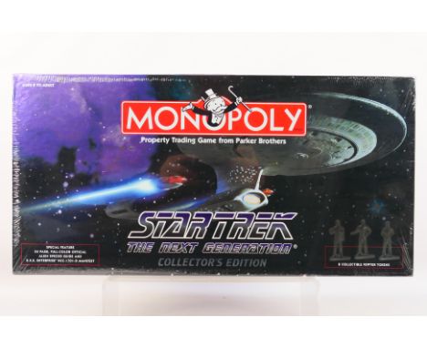 Hasbro - Monopoly - An unopened Star Trek The Next Generation Collector's Edition Monopoly set 1998 issue. This set is still 