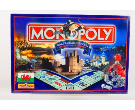 Hasbro - Monopoly - An unopened Wales-Cymru Edition Monopoly set year 2000 issue. This set is still factory shrink wrapped so