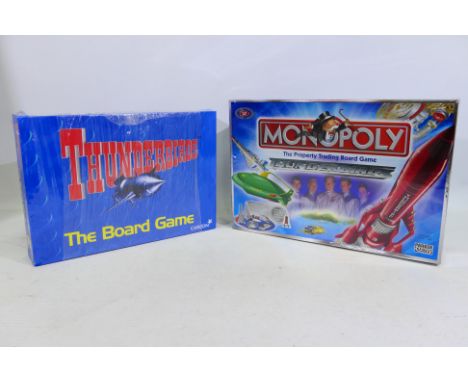 Hasbro - Monopoly - An unopened Thunderbirds Edition Monopoly set 2004 issue. This set is still factory shrink wrapped so app