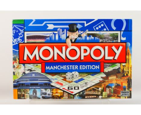 Hasbro - Monopoly - An unopened Manchester Edition Monopoly set 1999 issue. This set is still factory shrink wrapped so appea