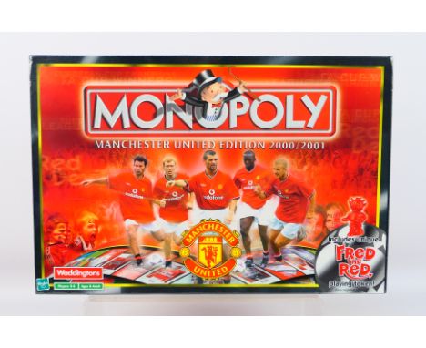 Hasbro - Monopoly - An unopened Manchester United Edition Monopoly set 2000/2001 issue. This set is still factory shrink wrap