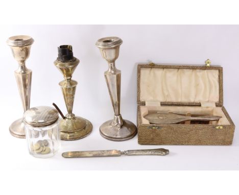 Dressing table jar with silver top, pair silver candlesticks and table lamp weighted bases, child's brush and comb cased    C