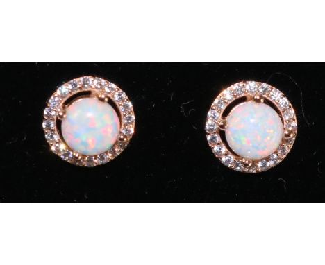 Pair of opal rose-gold plated ear-rings   Condition Report   Click here for further images, condition, auction times & delive