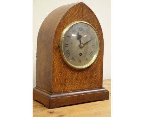 Late 19th century oak lancet shaped mantle clock, H35cm   Condition Report   Click here for further images, condition, auctio