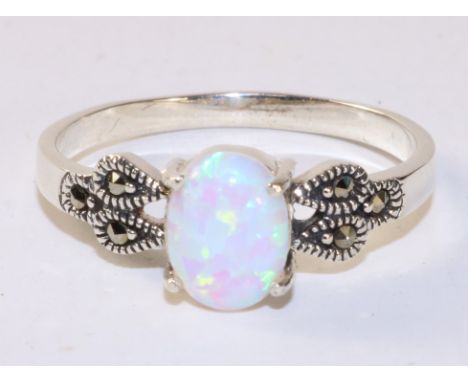 Opal and marcasite ring stamped 925   Condition Report   Click here for further images, condition, auction times & delivery c