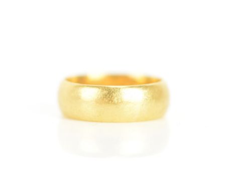 A 22ct gold wedding band, hallmarked London 1967, ring size R, 10.2 gramsIf there is no condition report shown, please reques