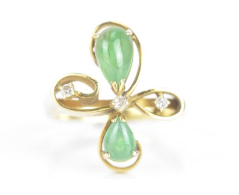 A jade and diamond 14ct yellow gold dress ring, of floral design, with three brilliant cut diamonds, each approximately 1.3mm