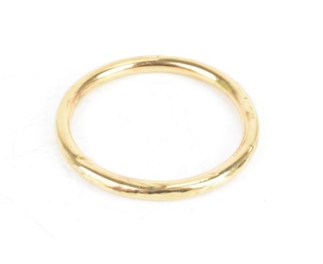 A 1920s 9ct yellow gold bangle, hallmarked Birmingham 1924, makers mark rubbed, 18.6 gramsIf there is no condition report sho