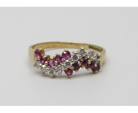 A 9ct gold, ruby and zircon ring, 1.4g, K