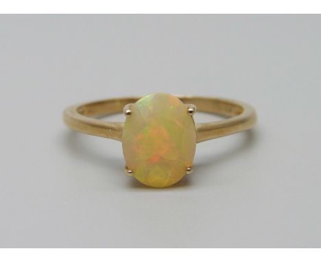 A 10k gold and faceted opal ring, 1.7g, P