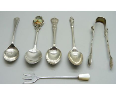 A collection of silver spoons, sugar nips, and a pickle fork, 53g, together with a plated spoon