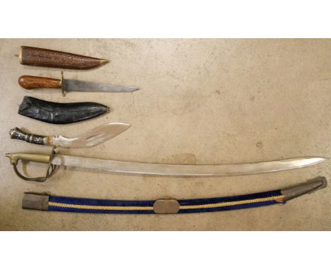 An Indian sword, Kukri and carving set