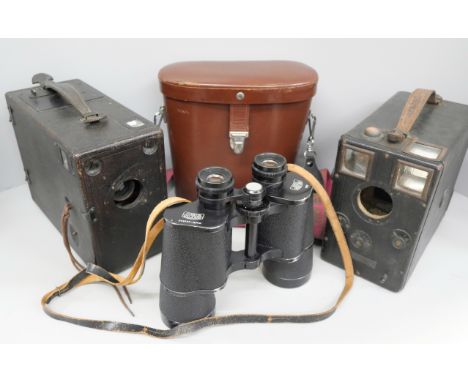 A pair of 10x50 Zeiss binoculars, cased, and two vintage cameras, one a/f