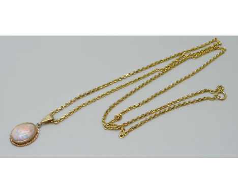 A 9ct gold chain with a yellow metal set opal pendant, 9g total, 1.2 x 0.9cm opal, 60cm chain