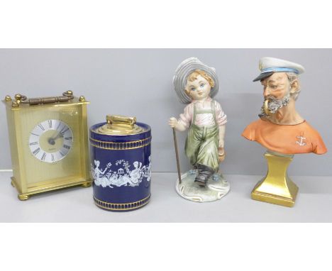 Two Italian porcelain figures, including Capodimonte Urchin Hiker, a Colibri Fiorentine table lighter and a small quartz cloc