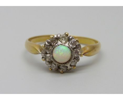 An 18ct gold opal and diamond cluster ring, 2.6g, O