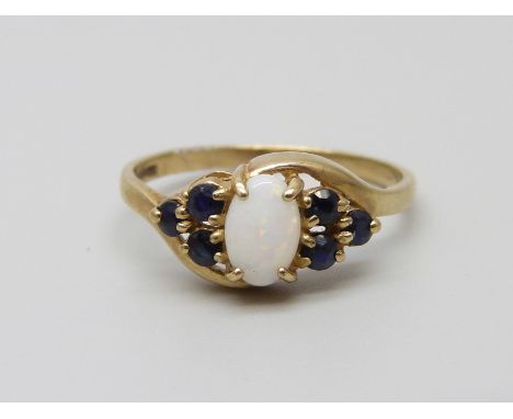 A 9ct gold, opal and sapphire ring, 1.3g, I/J
