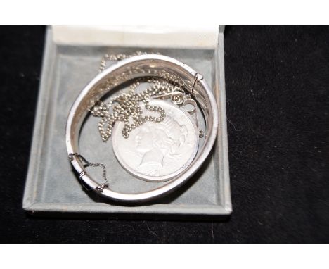 Silver Bangle together with a Limited 1928 Dollar