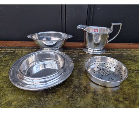 A White Star line silver plated milk jug and sugar bowl, marked 'A' for First Class, circa 1922; together with a similar&nbsp