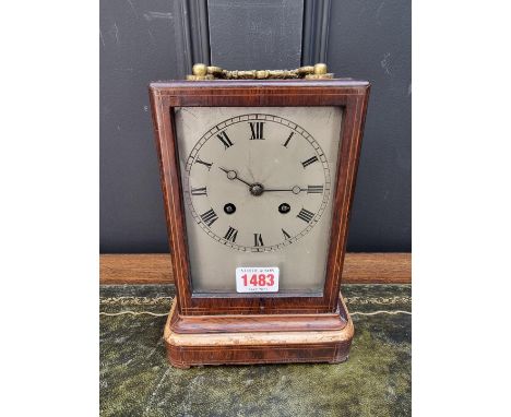 A late 19th century French rosewood and inlaid mantel clock,&nbsp;23.5cm high, with pendulum.&nbsp; 